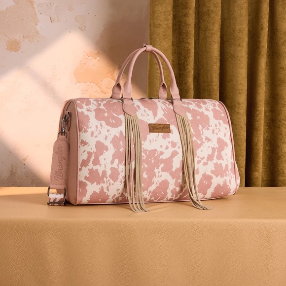 Wrangler Handbags - Wrangler Cow Print Fringe Duffle/Crossbody- Dark Pink